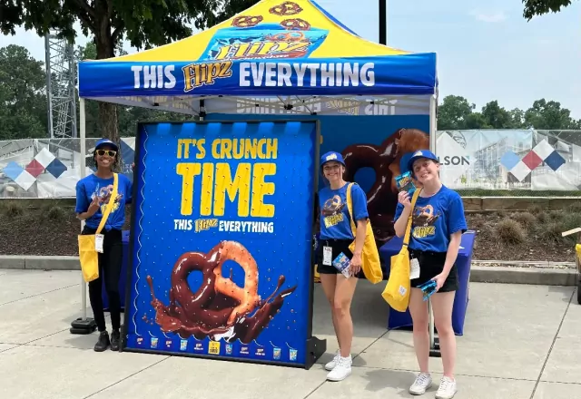 youth posing by a snack stand