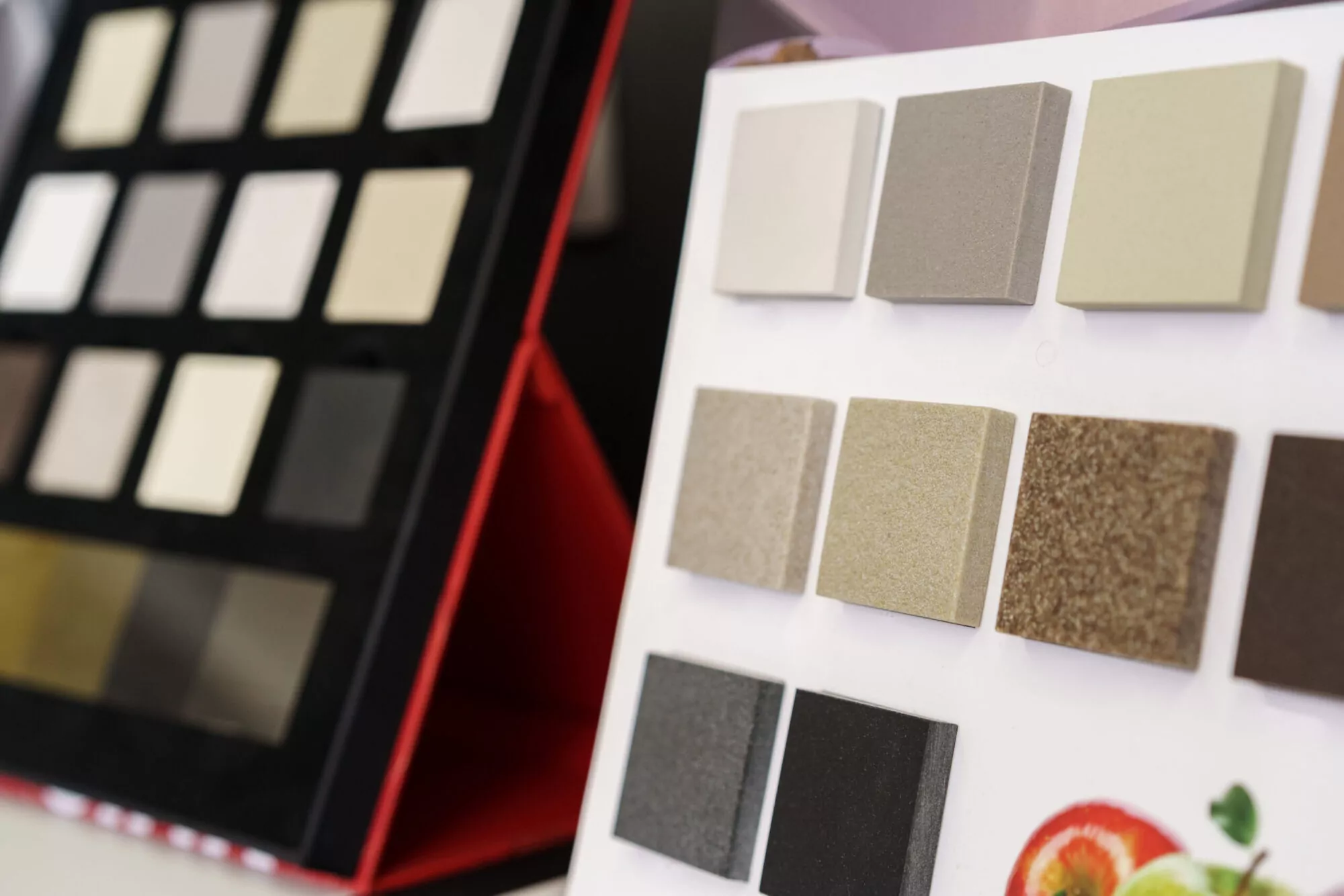 Close-up of countertop display with product samples in various colors, highlighting effective product placement and display options.
