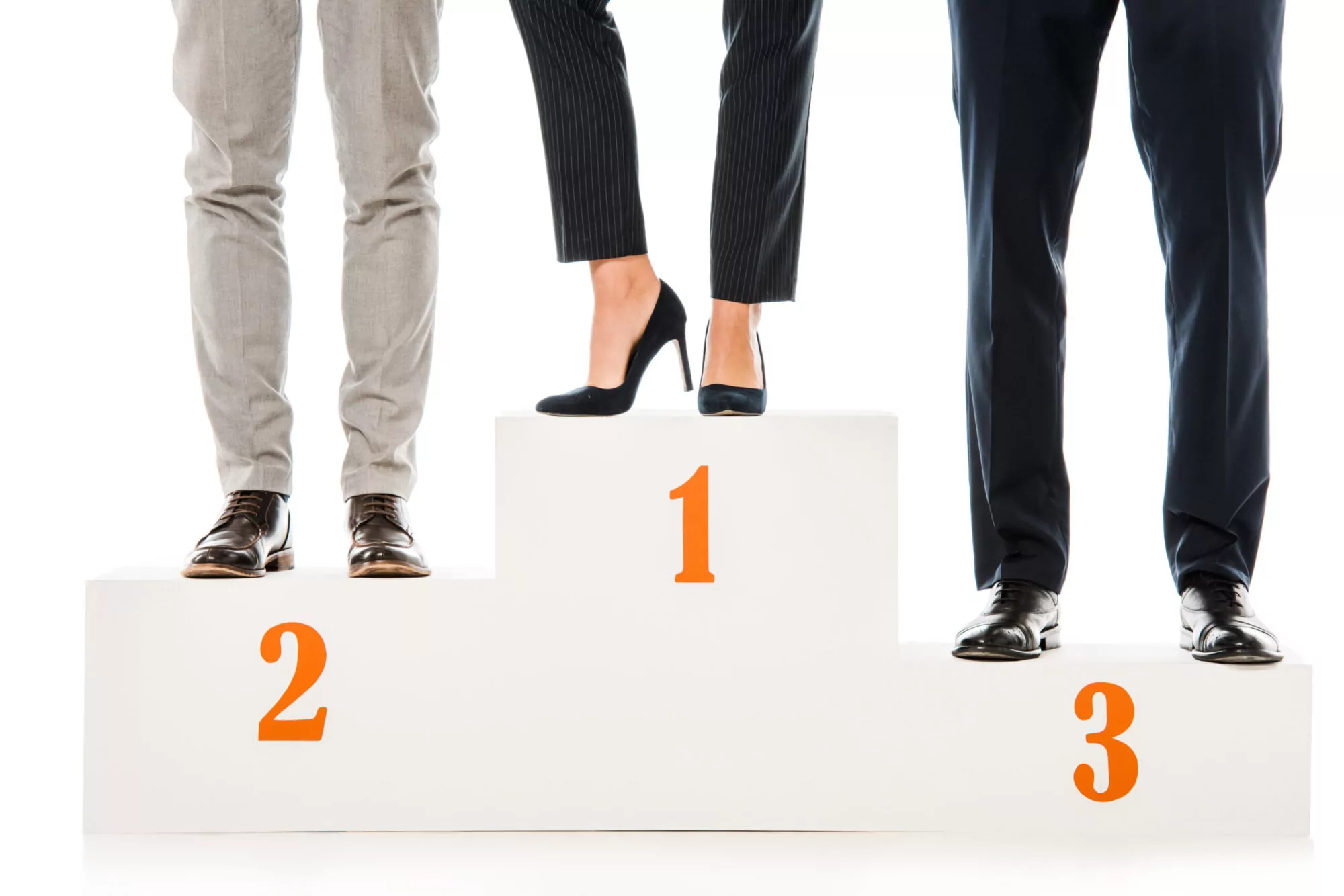 businesspeople standing on winners podium isolated on white